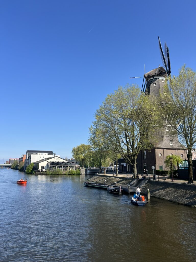 Windmill brewery overlooking the canal on a sunny day.