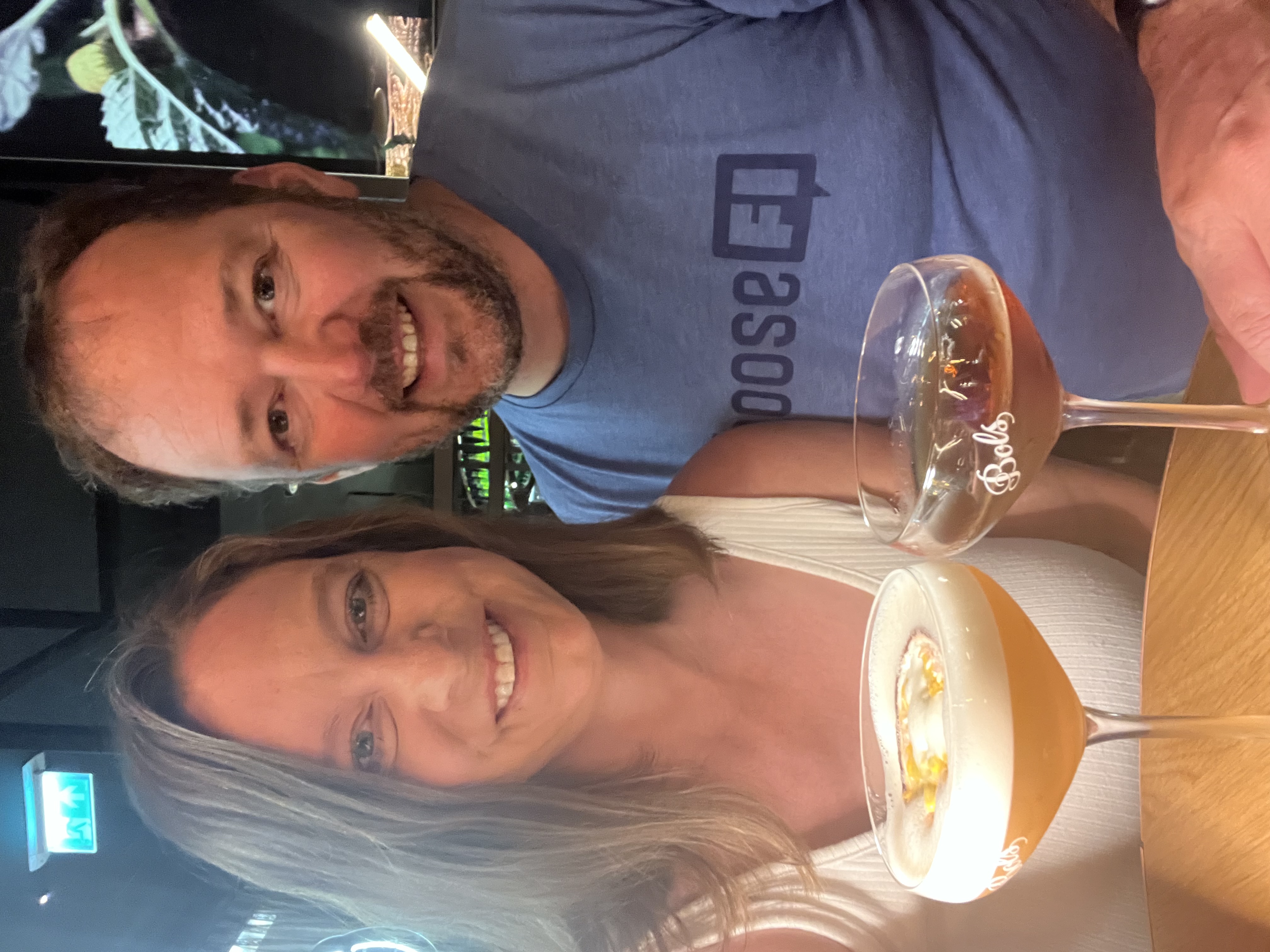 Jasper and Katie with two cocktails