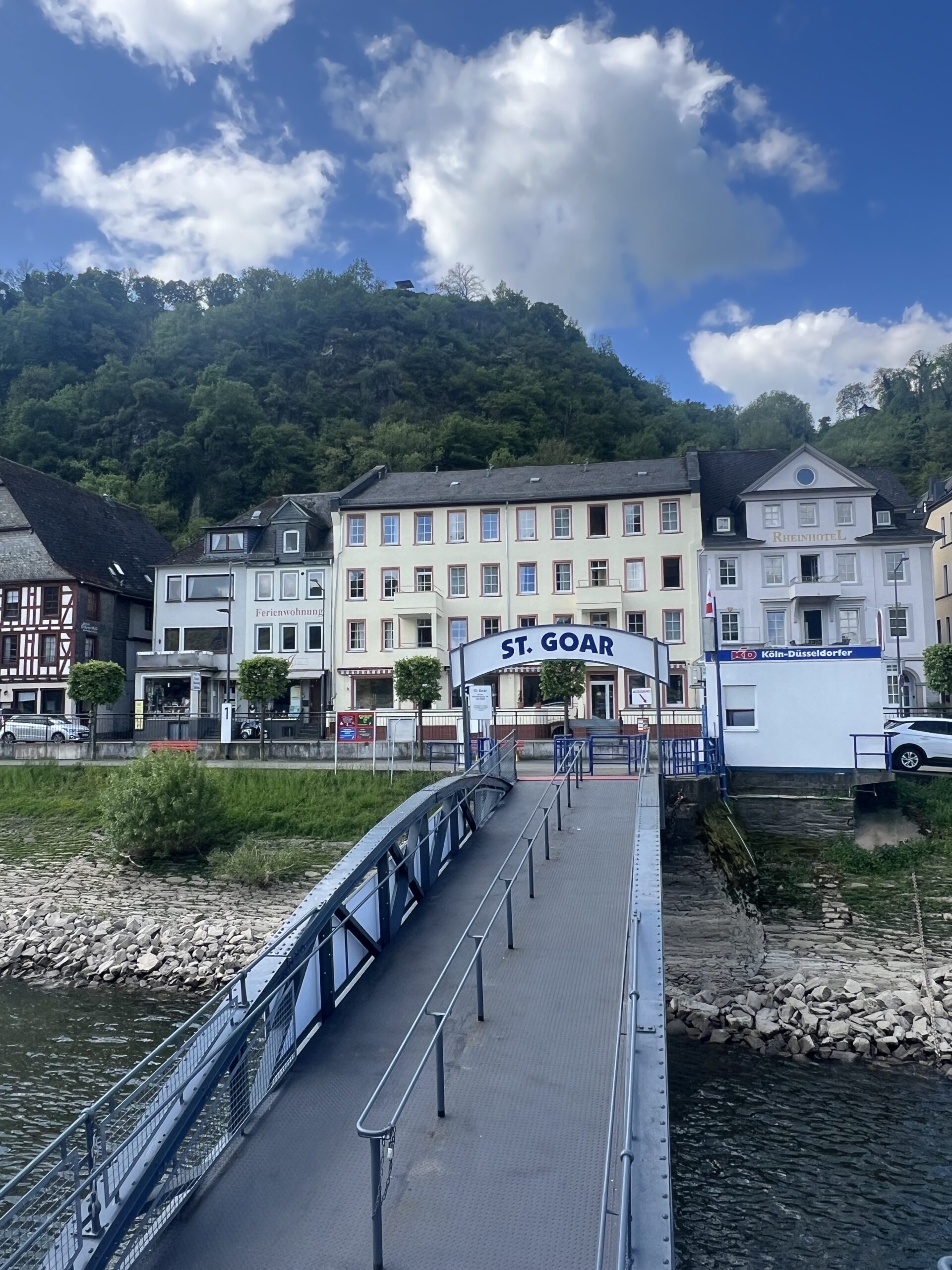 St. Goar Hotel on a sunny day with trees in the back drop 