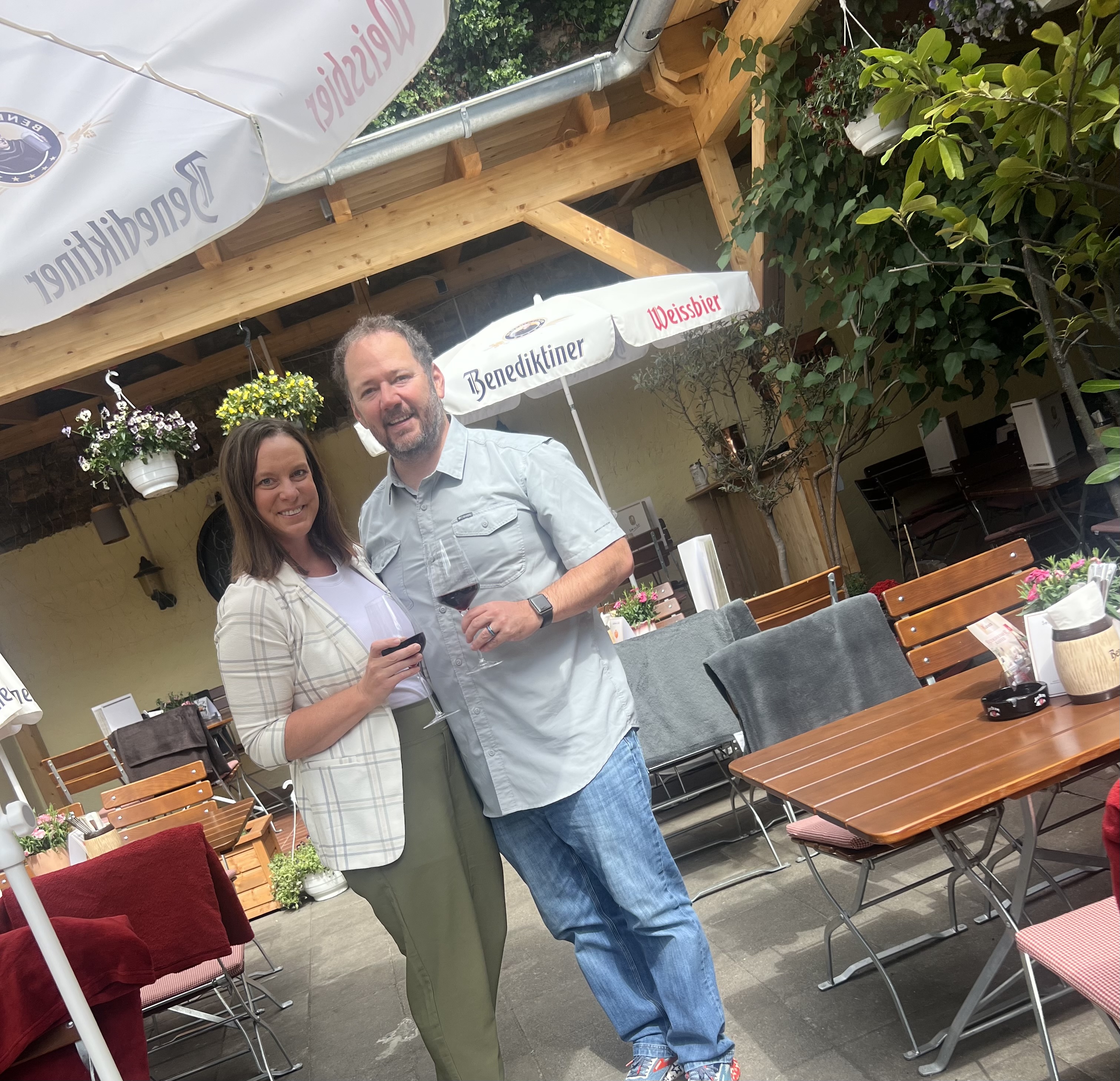 Couple Enjoying wine in a garden setting